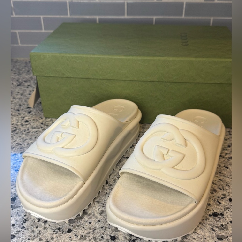 Gucci Off-White Embossed Logo Platform Slides